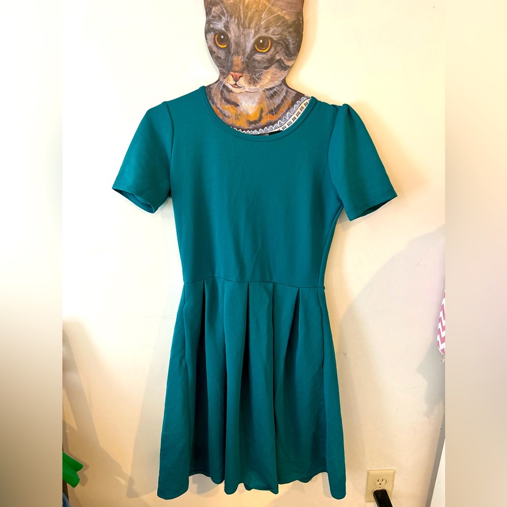 Knee length empire waist teal dress